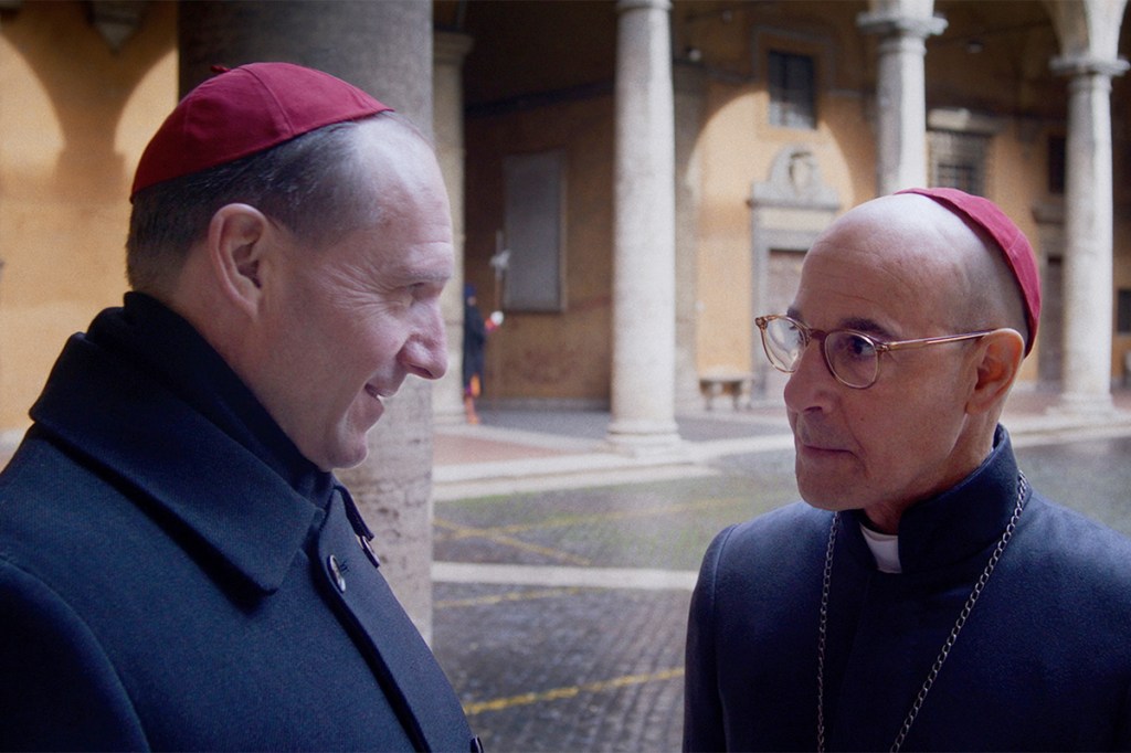 (L to R) Ralph Fiennes as Cardinal Lawrence and Stanley Tucci as Cardinal Bellini in director Edward Berger's CONCLAVE, a Focus Features release. Credit: Courtesy of Focus Features. © 2024 All Rights Reserved.