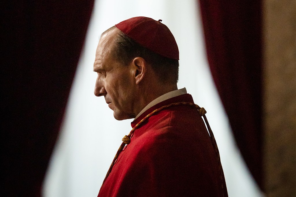 Ralph Fiennes stars as Cardinal Lawrence in director Edward Berger's CONCLAVE, a Focus Features release. Credit: Philippe Antonello/Focus Features ©2024 All Rights Reserved.