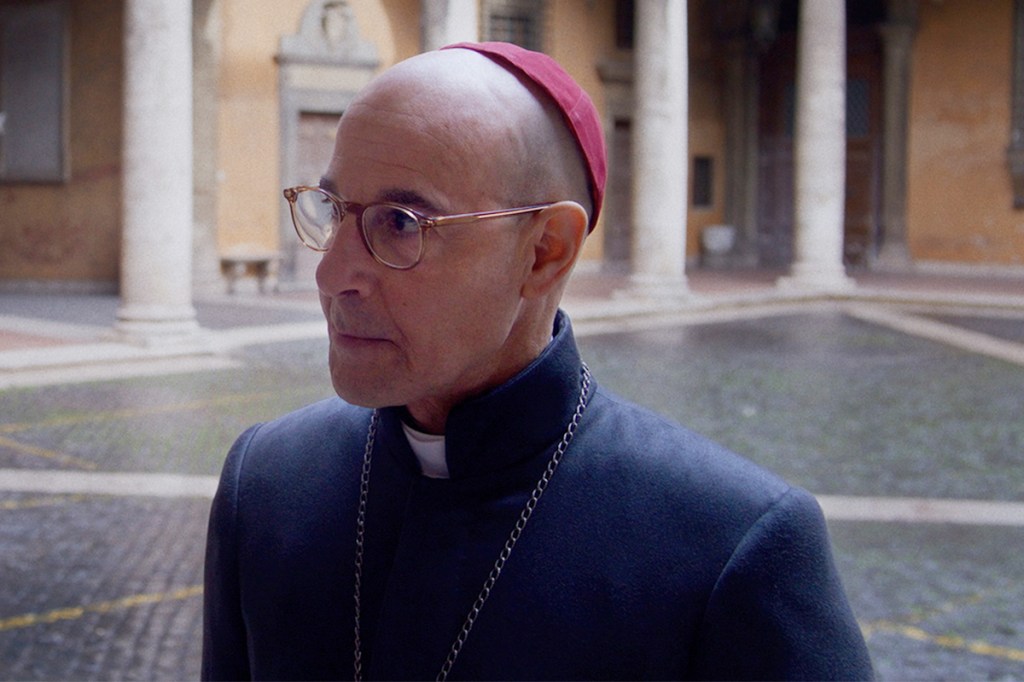 (L to R) Ralph Fiennes as Cardinal Lawrence and Stanley Tucci as Cardinal Bellini in director Edward Berger's CONCLAVE, a Focus Features release. Credit: Courtesy of Focus Features. © 2024 All Rights Reserved.