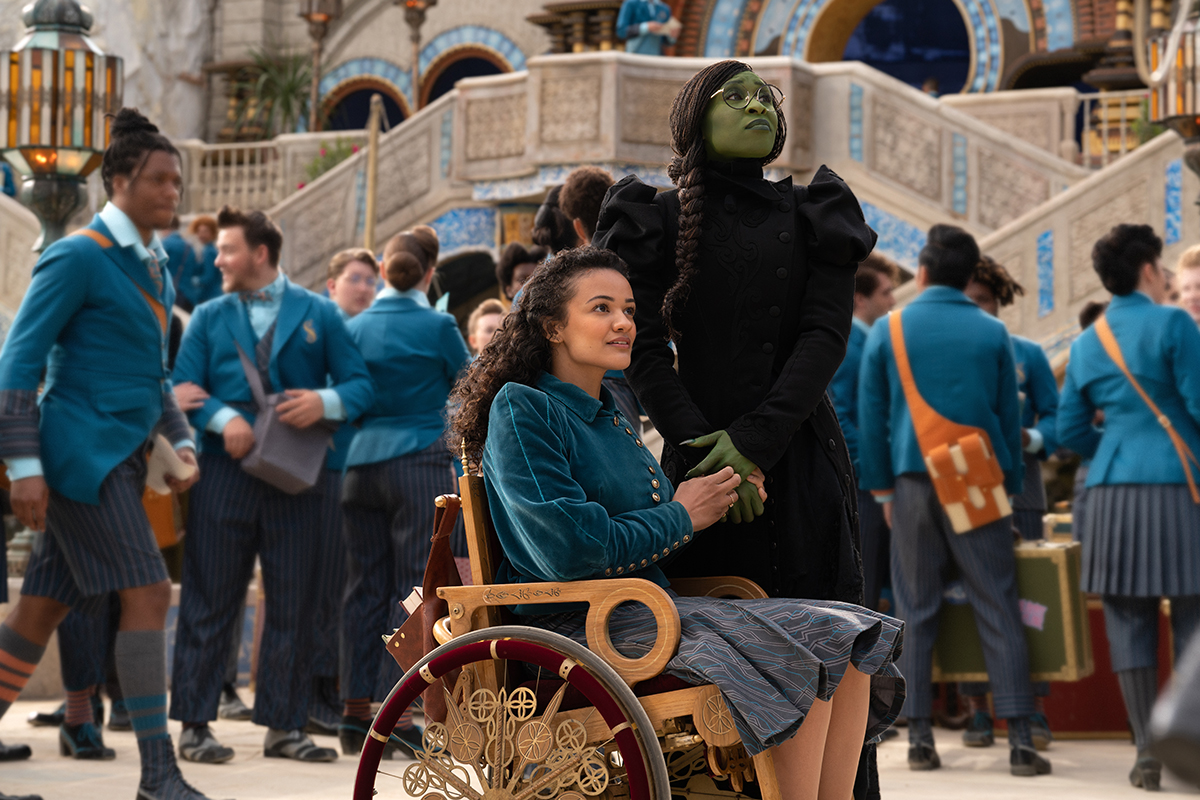 L to R: Marissa Bode is Nessarose and Cynthia Erivo is Elphaba in WICKED, directed by Jon M. Chu